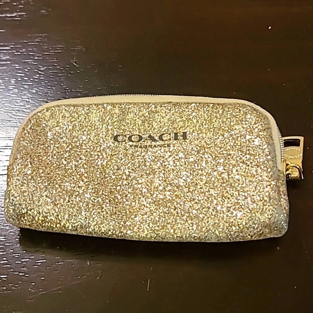 Gold coach coin purse